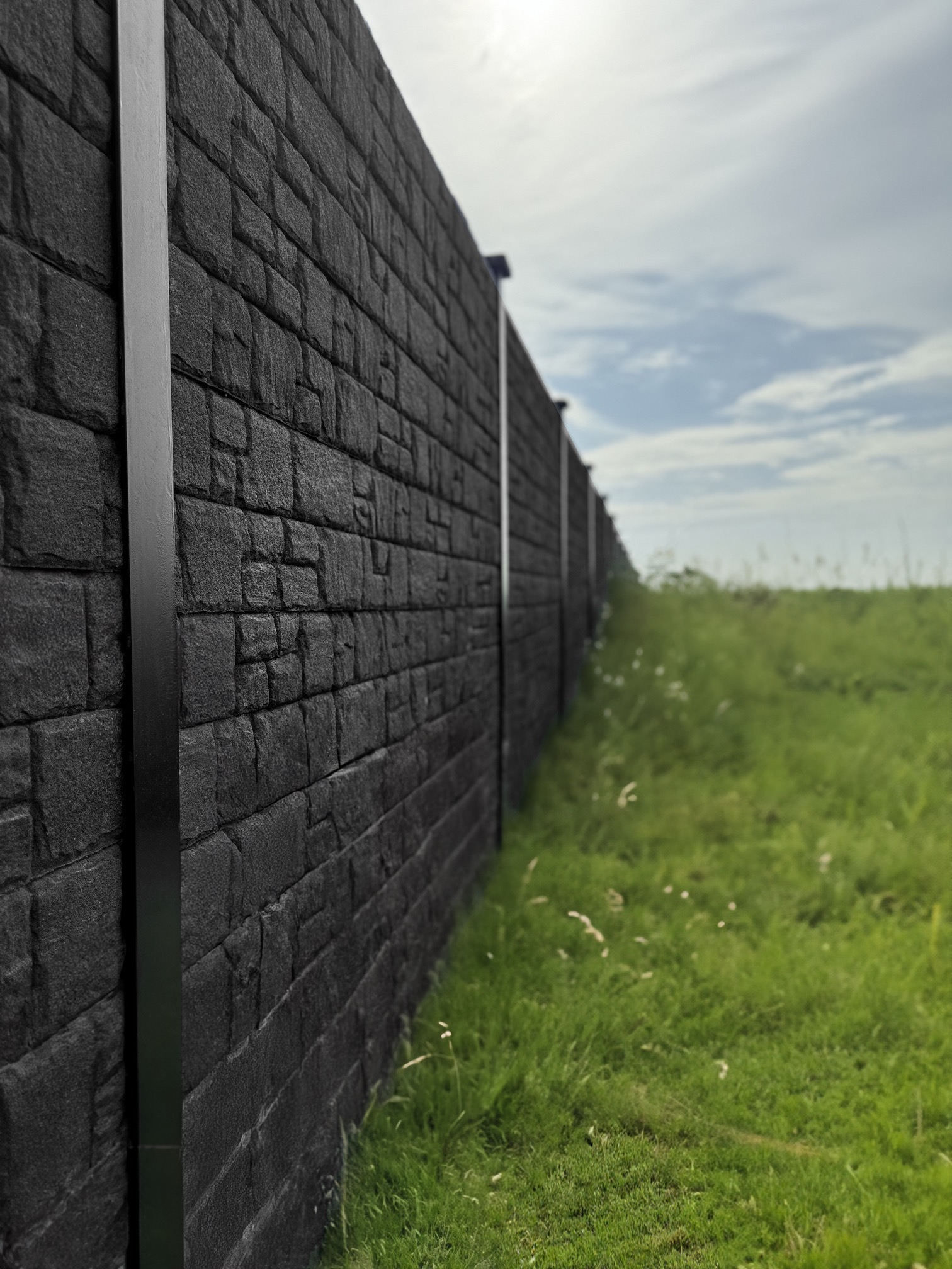 HD Eco-Wall heavy duty recycled rubber sound barrier panels installed along Texas highway HD Eco-Wall heavy duty recycled rubber sound barrier panels installed along Texas highway